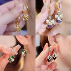 ✨【Kup 1, a 1 dostaniesz gratis】Eleganckie złote kolczyki z błyszczącymi diamentami