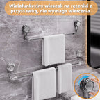 🚿✨【Kup jeden, a drugi otrzymasz gratis】Obrotowy wieszak na ręczniki z przyssawką, bez potrzeby wiercenia.