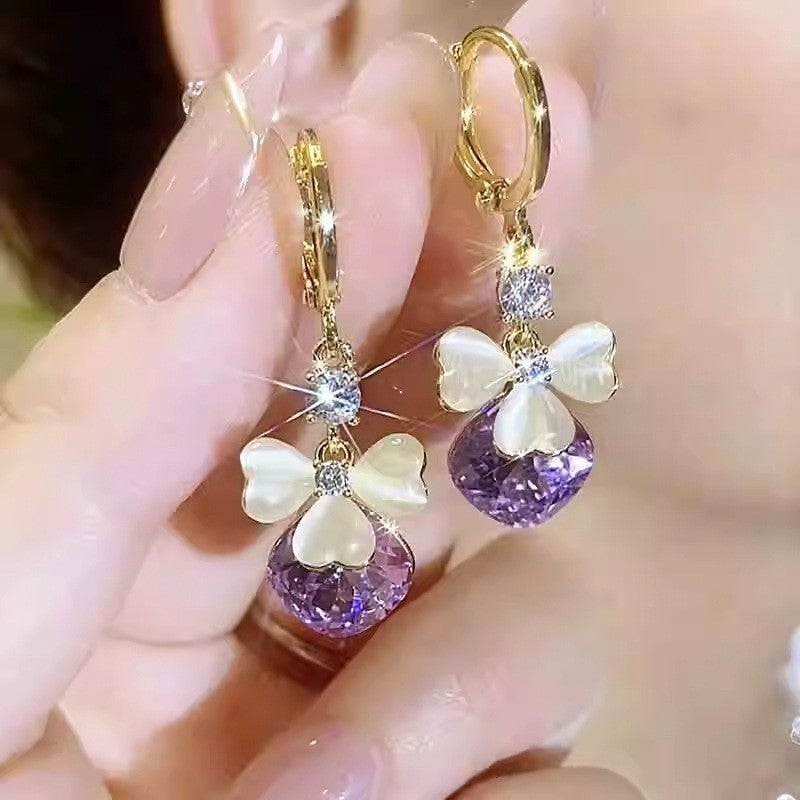 ✨【Kup 1, a 1 dostaniesz gratis】Eleganckie złote kolczyki z błyszczącymi diamentami
