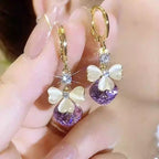 ✨【Kup 1, a 1 dostaniesz gratis】Eleganckie złote kolczyki z błyszczącymi diamentami