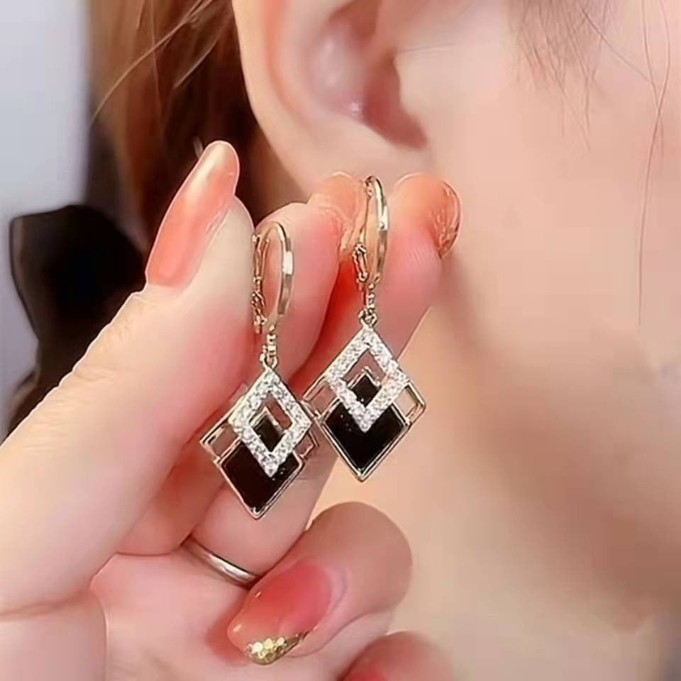 ✨【Kup 1, a 1 dostaniesz gratis】Eleganckie złote kolczyki z błyszczącymi diamentami